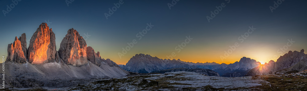 Panorama of Tre Cime peaks in Dolomites at sunset, Italy - obrazy, fototapety, plakaty 