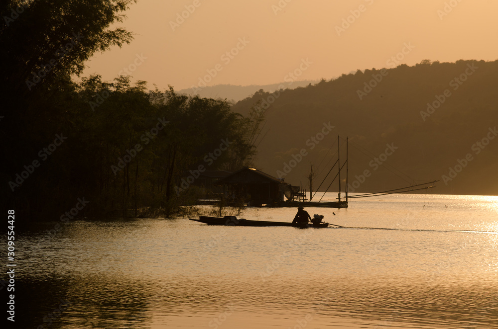 sunset or sunrise over river and mountain in Kanchanaburi Province, Thailand. sunset or sunrise over river and mountain in Kanchanaburi Province, Thailand.