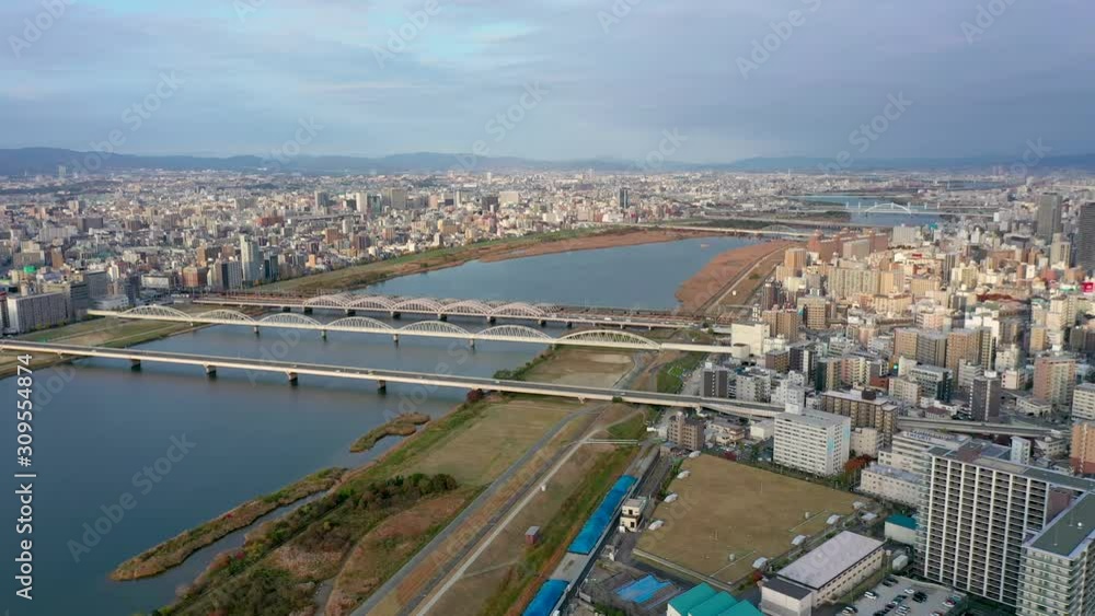 Aerial view 4k video by drone of River and building in Osaka city, Japan. Aerial view 4k video by drone of River and building in Osaka city, Japan.