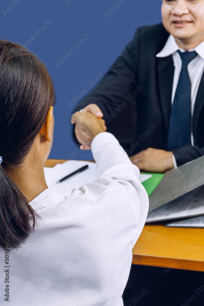 Obraz premium business and office concept -Shaking hands with partners