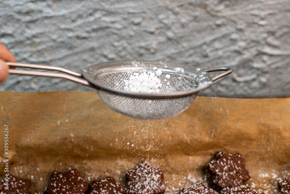 sprinkling with powdered sugar sprinkling with powdered sugar