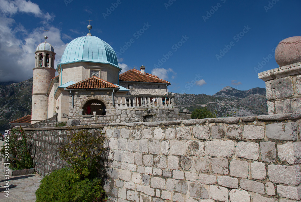 Boka Kotorska bay on the Montenegrin coast. Church of Mother of God on the Rock.