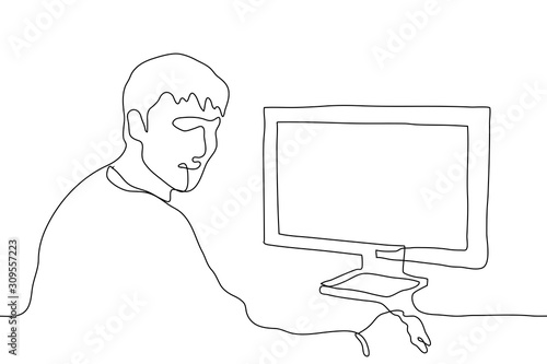 A linear drawing of the profile of a worker at a desktop with a computer, a computer mouse in his right hand. The man turned and looks at the viewer. Continuous line drawing of a man at a computer