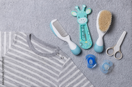 baby clothes with hygiene items. baby accesories