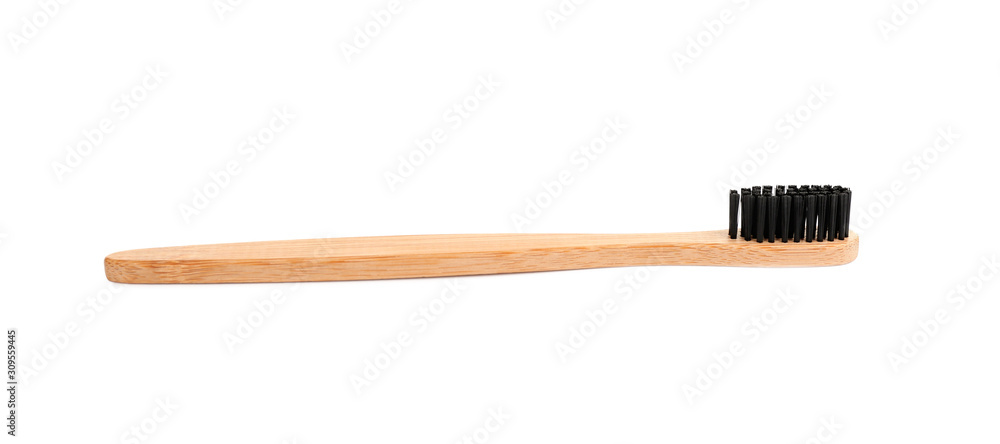 Bamboo toothbrush with charcoal bristle isolated on white Bamboo toothbrush with charcoal bristle isolated on white