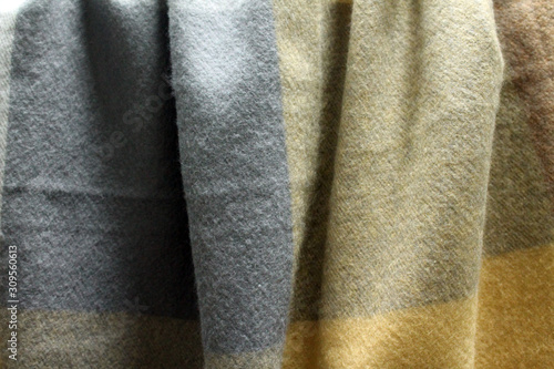 Soft warm fabric in gray and brown.