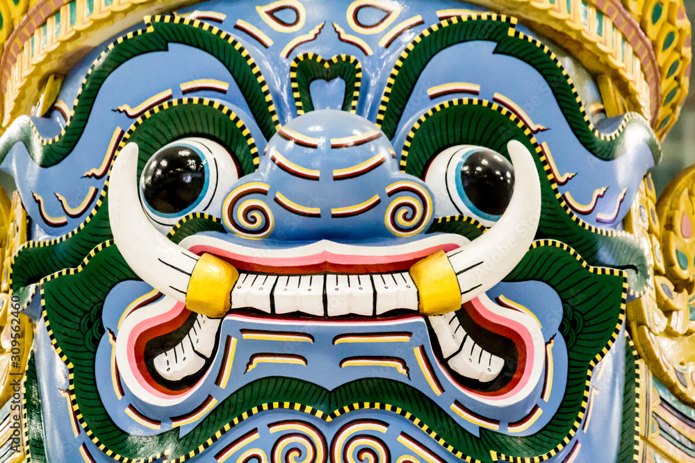 Antique Thai face giant. At Suvarnabhumi airport Thailand.