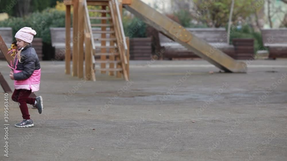 girl playing in the playground