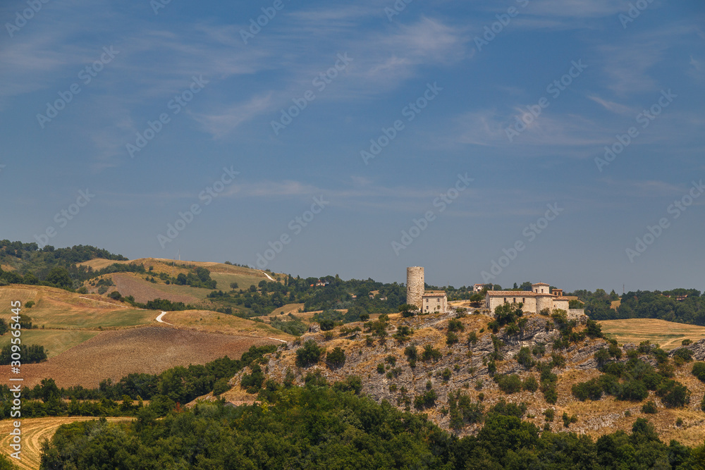 Landscape with medieval castle in the surroundings of San Marino, Italy