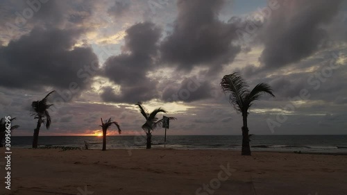 Timelapse of dark brooding Sunset on Senegambia Beach in Serrekunda The Gambia Africa photo