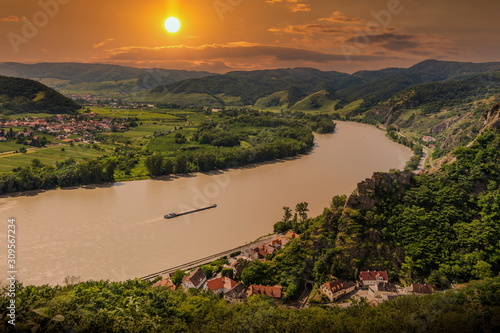 Photography Danube river in beautiful golden evening light at sunset, Wachau valley