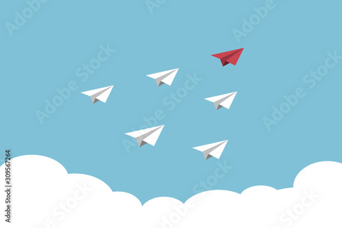 The red paper flying lead to the sky, leader business concept.
