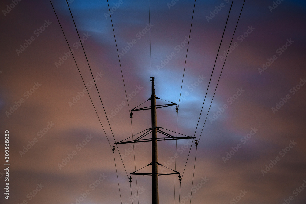 Power line at sunset. Electricity