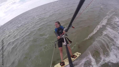 Girl kitesurfing