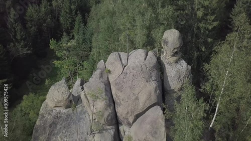 Aerial view stone rocks Ternoshorska Lada amidst beautiful scenic Carpathian mountains and forest. Symbol of motherhood and fertility, Kosiv Region, Ivano-Frankivsk Oblast, Ukraine photo