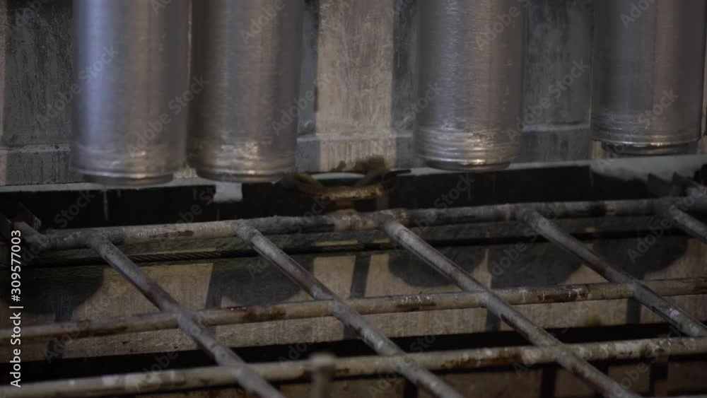 Forming aluminum column after melting in modern factory. Production of aluminium metal profiles, commonly used as material in construction and manufacturing. Forming aluminum column after melting in modern factory. Production of aluminium metal profiles, commonly used as material in construction and manufacturing.