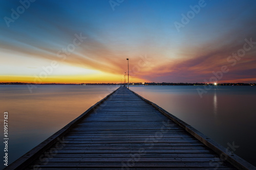 Fototapeta Naklejka Na Ścianę i Meble -  Diminishing perspective sunset, long exposure, at pier in Perth Australia