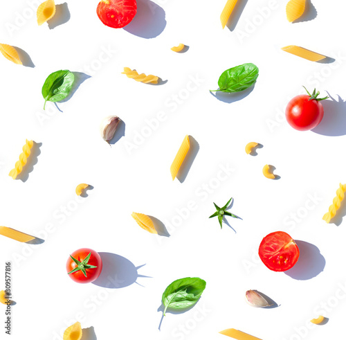 Italian pasta seamless pattern concept with tomatoes , fresh basil leaves and garlic. Food top view composition