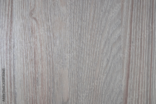 Light wood texture with brown veins.