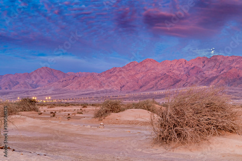 Colorful sunset in desert area of nature reserve and ecological ancient park ...