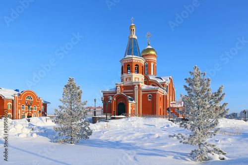 Orthodox Church among the snow in honor of the Epiphany in Novy Urengoy