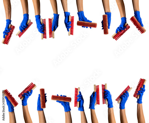 Many rhythmic hand in blue glove with red cleaning brush. Cleaning Products and Supplies. Isolated white background and copyspace