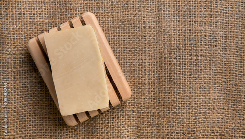 Handmade natural soap on fief canvas with copy space