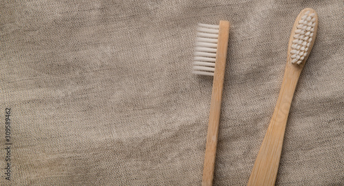 Photography Two eco toothbrushes on the natural fief background
