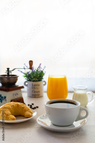 breakfast with coffee and croissant