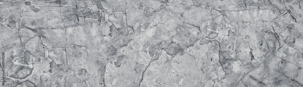 Broken gray concrete wide texture. Old weathered cement large panoramic grunge background Broken gray concrete wide texture. Old weathered cement large panoramic grunge background
