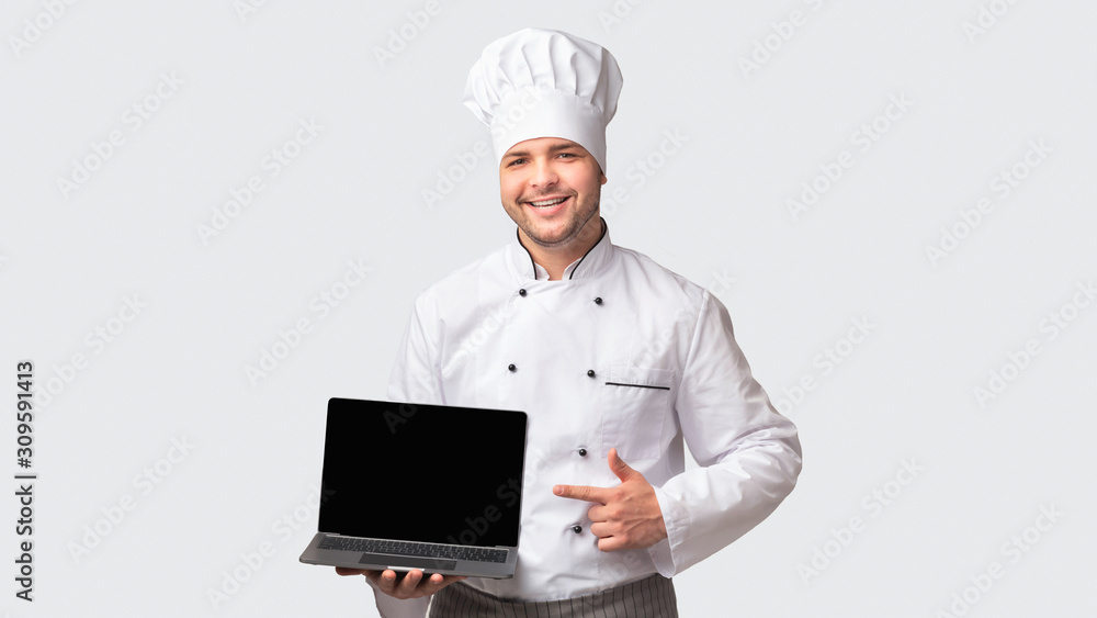 Chef Man Holding Laptop With Blank Screen Standing, White Background Chef Man Holding Laptop With Blank Screen Standing, White Background