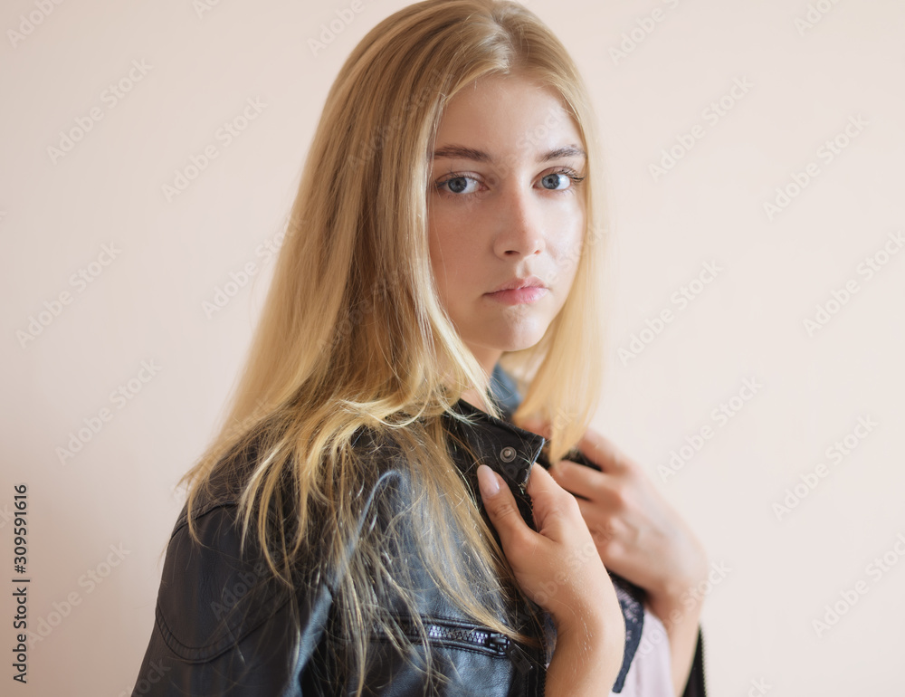Portrait of beautiful sensual woman with blue eyes. Studio shot. Portrait of beautiful sensual woman with blue eyes. Studio shot.