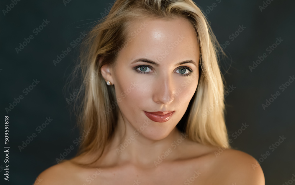 Portrait of beautiful sensual woman with green eyes. Studio shot. Portrait of beautiful sensual woman with green eyes. Studio shot.