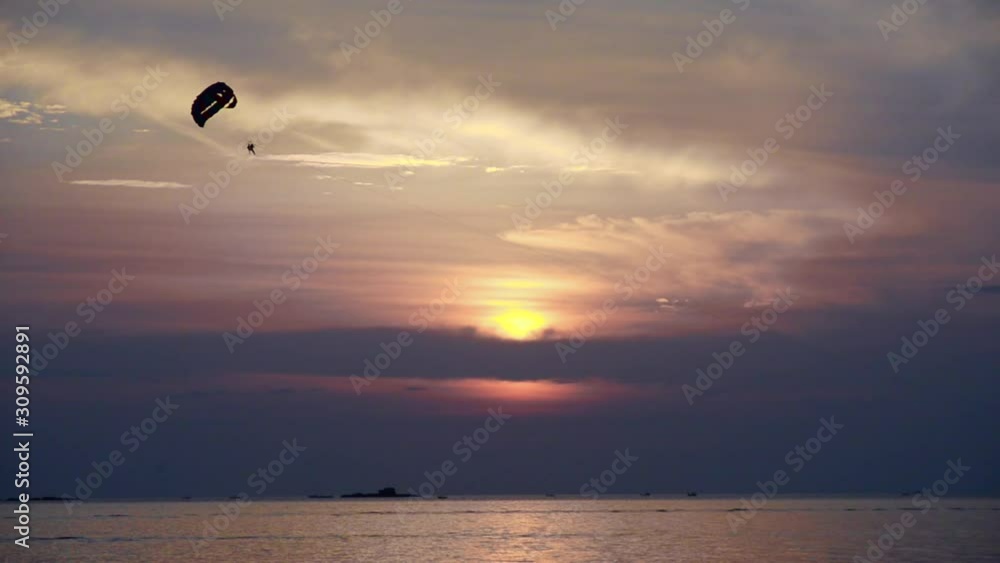 Parasailing at sunset LANGKAWI island, MALAYSIA Parasailing at sunset LANGKAWI island, MALAYSIA