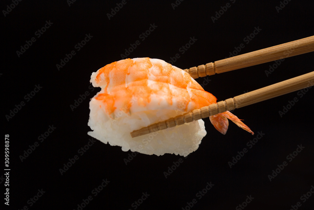 Sushi close-up, Japanese food on black background. Sushi close-up, Japanese food on black background.