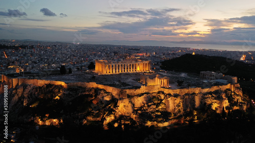 Aerial drone night shot of iconic Acropolis hill and the Parthenon at dusk with beautiful sky colours, Athens, Attica, Greece