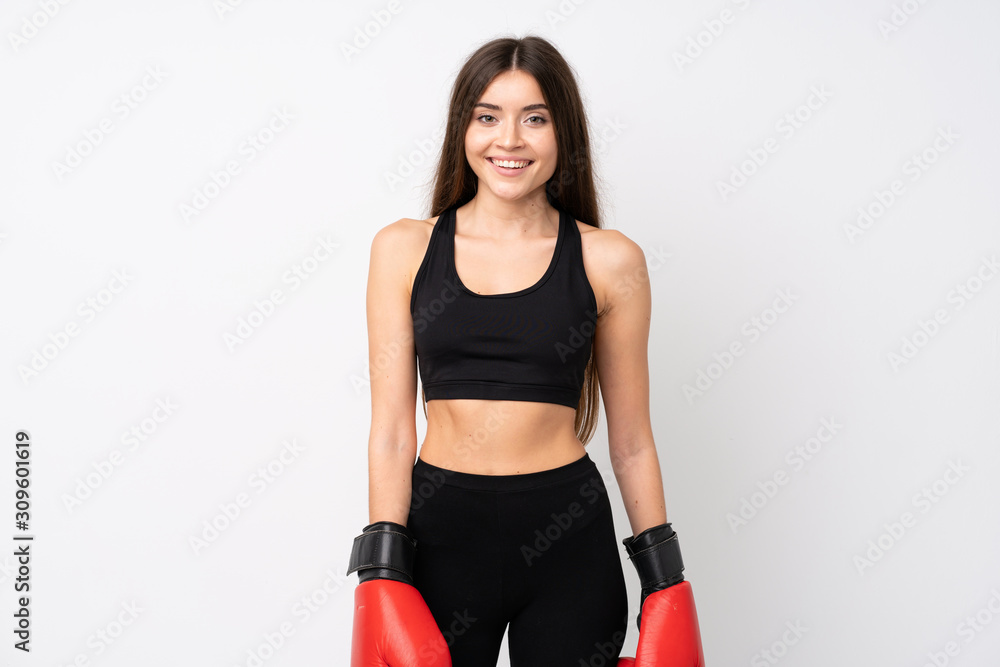 Young sport woman over isolated white background with boxing gloves Young sport woman over isolated white background with boxing gloves