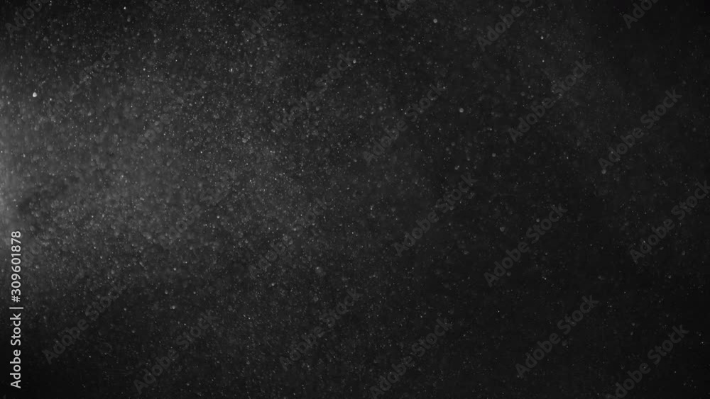 Natural Organic Dust Particles Floating On Black Background. Glittering Sparkling Particles Randomly Spin In The Air With Bokeh. Dynamic Particles With Fast And Slow Motion. Shimmering Dust In Space. Natural Organic Dust Particles Floating On Black Background. Glittering Sparkling Particles Randomly Spin In The Air With Bokeh. Dynamic Particles With Fast And Slow Motion. Shimmering Dust In Space.