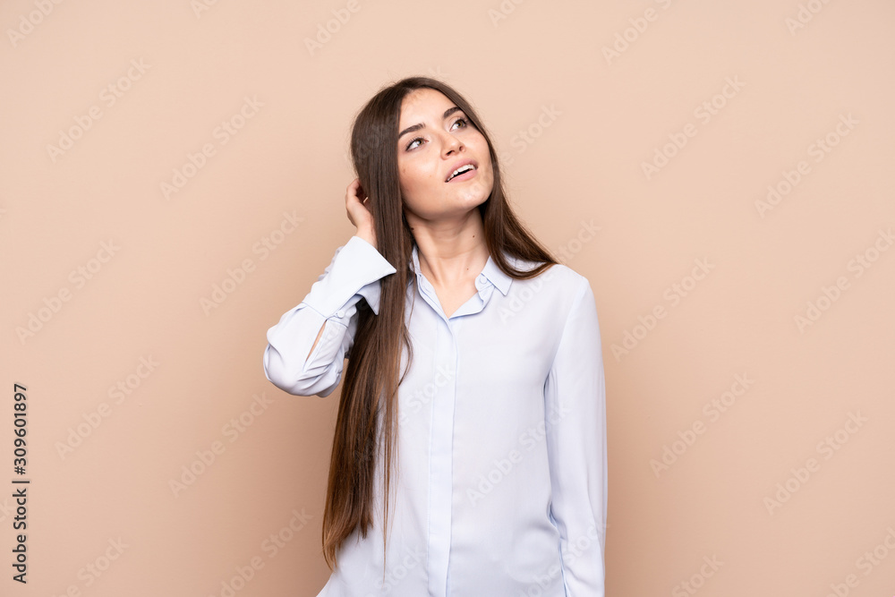 Young woman over isolated background thinking an idea Young woman over isolated background thinking an idea