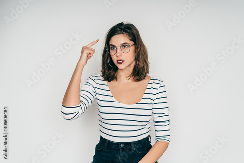 Woman showing crazy gesture looking away