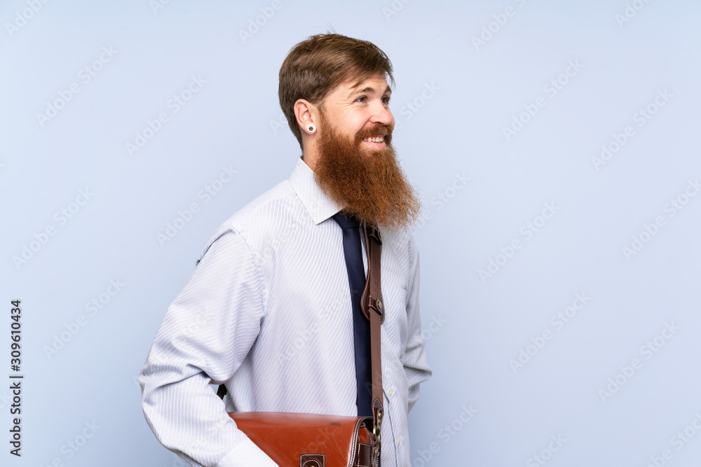Businessman with long beard over isolated background Businessman with long beard over isolated background