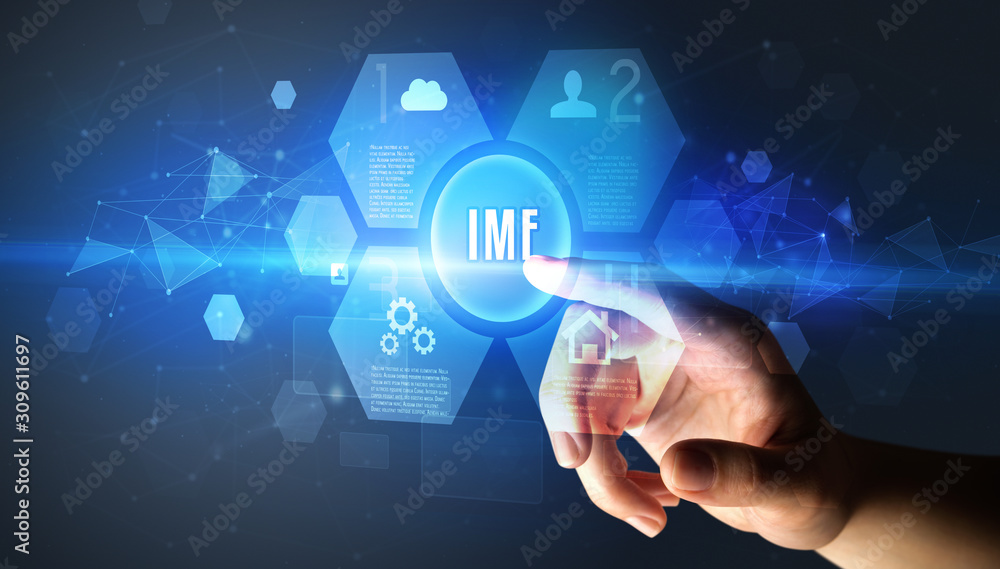 Hand touching IMF inscription, new technology concept Hand touching IMF inscription, new technology concept