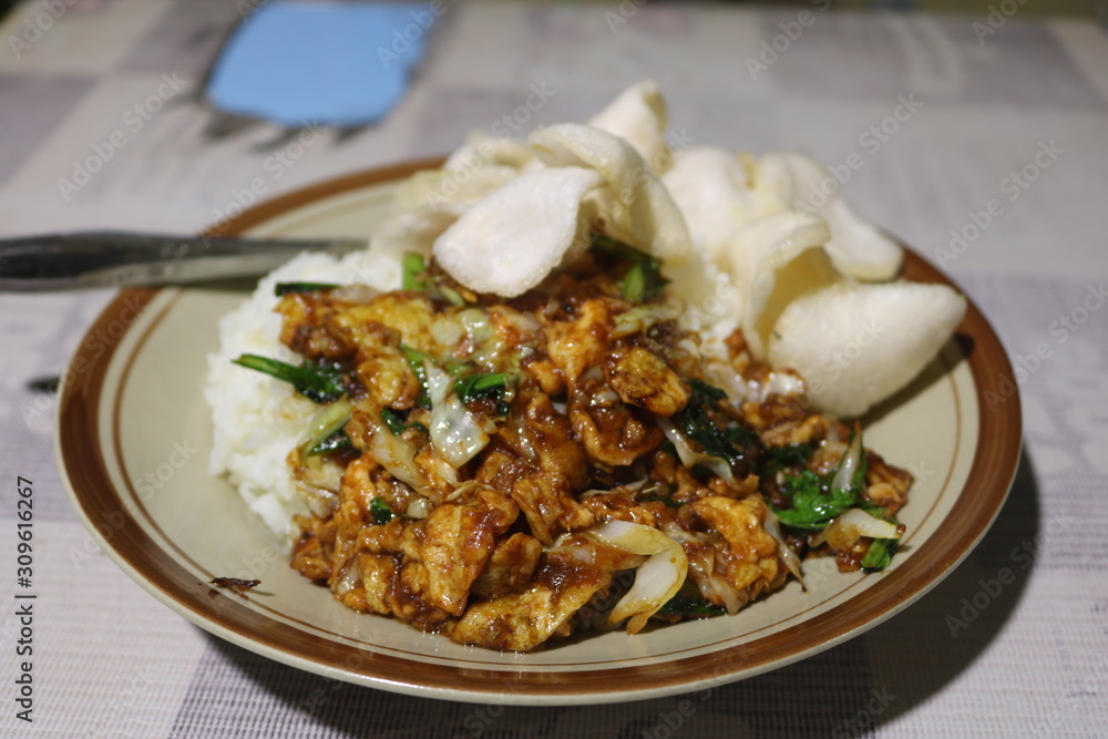 rice with delicious fried eggs on the table.. rice with delicious fried eggs on the table..