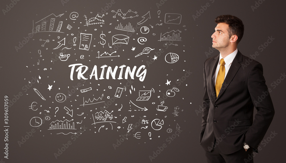 Businessman thinking with TRAINING inscription, business education concept Businessman thinking with TRAINING inscription, business education concept