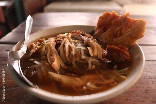 Soto is a traditional Indonesian soup mainly composed of broth, meat, and vegetables. Many traditional soups are called soto, whereas foreign and Western influenced soups are called sop. photo