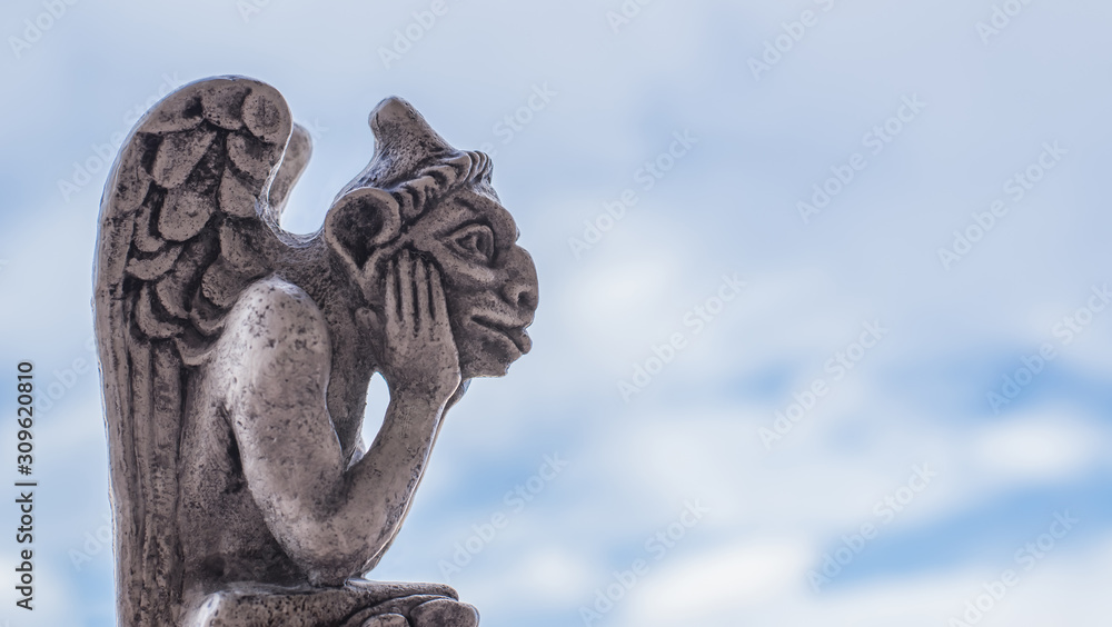 Gargoyle statue, chimeras on the Notre Dame de Paris