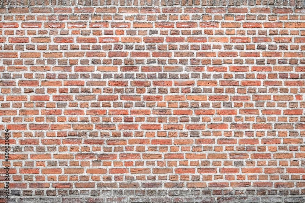 Fototapeta premium Red brick wall texture grunge background. Old red brick wall texture