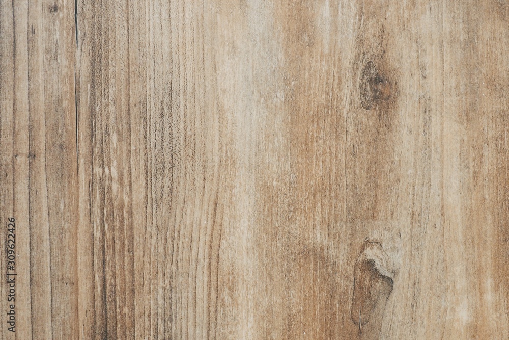 Obraz premium Closeup of wooden wall with texture and rough surface in warm brown tone for background and decoration.