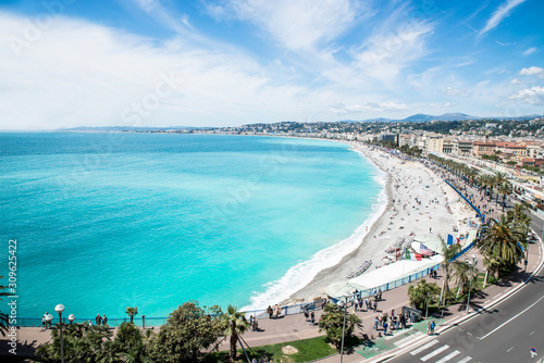 View of the beach in the city of Nice, azure shore Mediterranean sea, France 