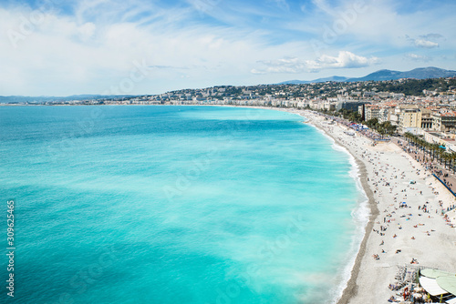 View of the beach in the city of Nice, azure shore Mediterranean sea, France 